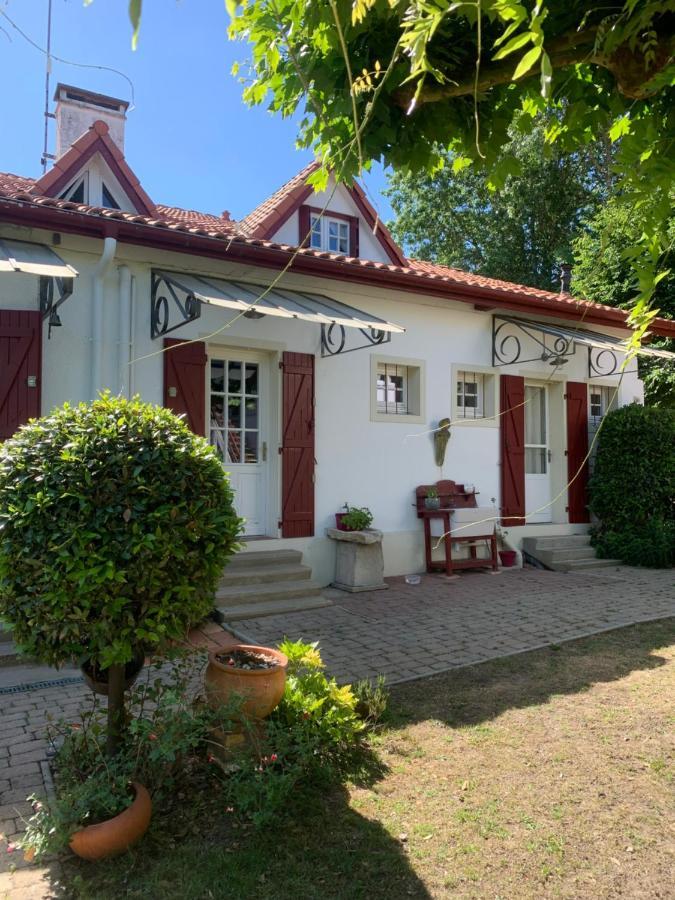 Maison De